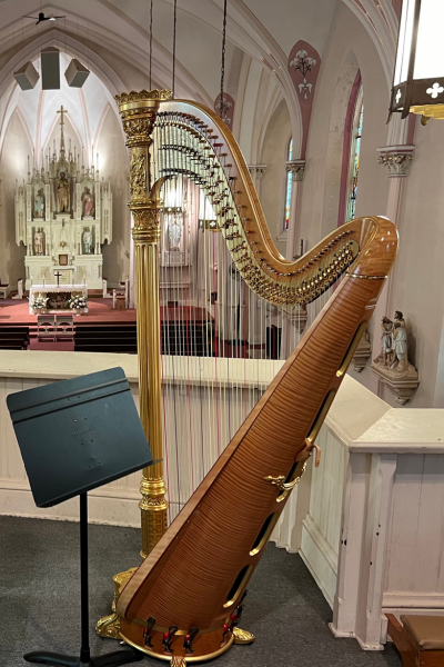 wedding placeholder A harp with a music stand in the balcony of a church